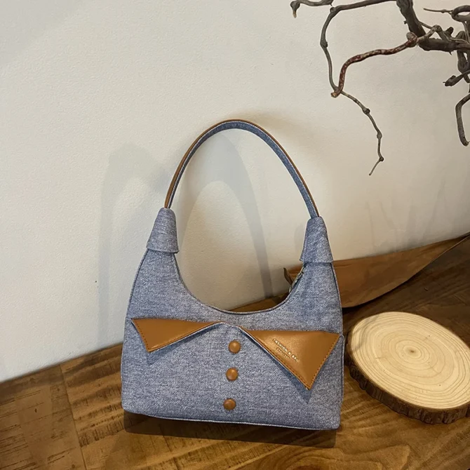 Niche design, high-end feel, contrasting color buttons, underarm bag, versatile commuting shoulder bag, handbag